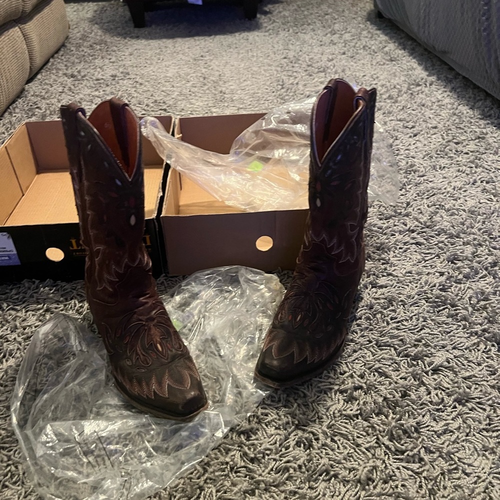 Probably worn 2 maybe three time Men Dan Post size 10.5 paid over 600$ for these